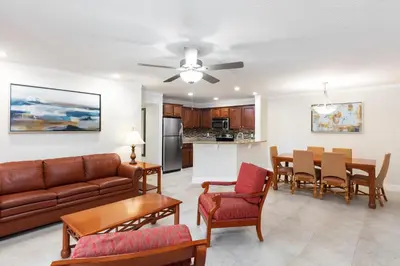 a living room with a couch and a table at Westgate Blue Tree Resort in Orlando
