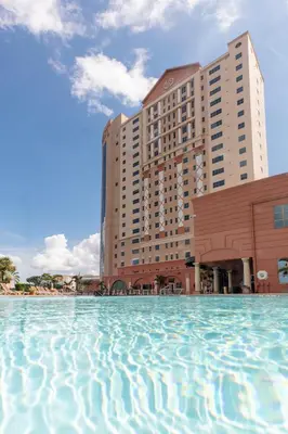 a large pool of water in front of a hotel at Westgate Palace Hotel - Universal - I-Drive in Orlando