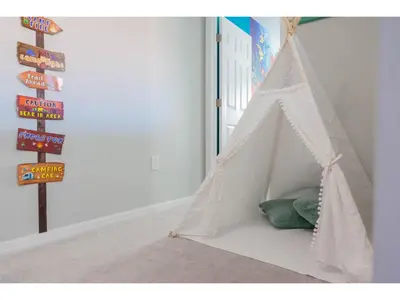 a white teepee tent in a childs room at Best place to unwind and have lots of fun! in Kissimmee