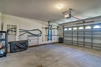 a garage with horse stalls in it at No Pet Fee! Snowbird Haven in Lake Worth Beach! in Orlando