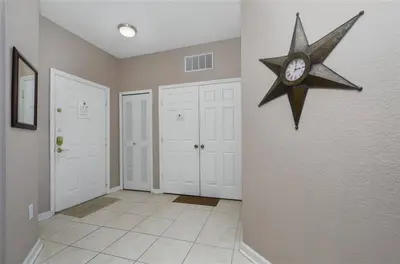 a room with a star clock on the wall at 3 bedroom Disney Condo Windsor Hills in Orlando
