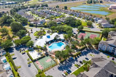 an overhead view of a pool at a resort at Fantastic Resort 5BR House - South Facing Pool Spa villa in Kissimmee
