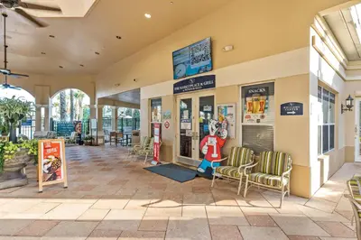 a store front with chairs and a character in the window at WH2618DS Windsor Hills Retreat in Orlando