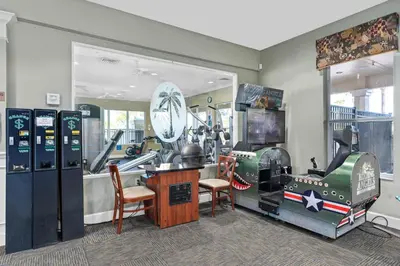 a room with a room with machines in it at WH2618DS Windsor Hills Retreat in Orlando