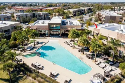 an aerial view of the pool at the resort at Marvelous 4 Bd Close to Disney @ Magic Village 3153 in Orlando