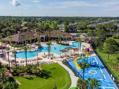 an aerial view of a pool at a resort at Spacious 4BR Home Themed Rooms, Pool, Near Disney in Orlando