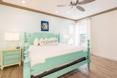 a blue and white bedroom with a bed and a ceiling fan at Brilliant Cottage Near Disney With Private Pool & Margaritaville Resort & Island H20 Waterpark Access - 3080Ph in Orlando