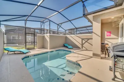 an indoor swimming pool with a glass ceiling at 4200 Paragraph Drive in Kissimmee