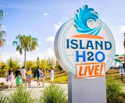 a sign for island hogan live at a beach at Sunburnt Cottage With Hot Tub Near Disney With Margaritaville Resort & Island H2O Access - 8041Sh in Orlando