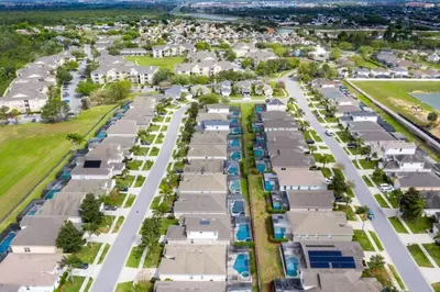 an aerial view of a village with houses at Amazing Disney Dream Getaway in Windsor Palms! villa in Kissimmee