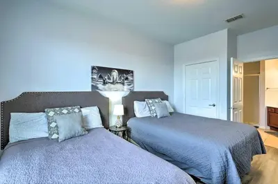 a bedroom with two beds next to each other at SeaworldDisneyUniversal Villa 5 beds 3 bed2bath in Orlando