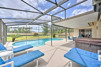 an image of a swimming pool in a house at about 5 Mi to Theme Parks Kissimmee Home with Pool in Orlando