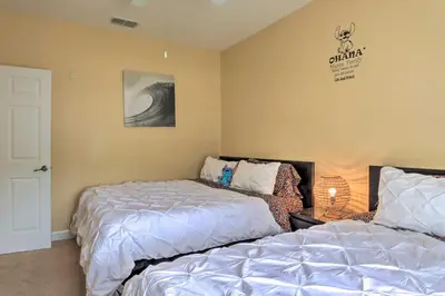 a bedroom with two beds next to each other at Sun-Soaked Kissimmee Gem with Resort Amenities! in Kissimmee