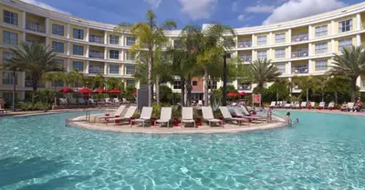 a pool in front of a hotel at Hotel Apt at Celebration 10 min from Disney MH225 in Orlando