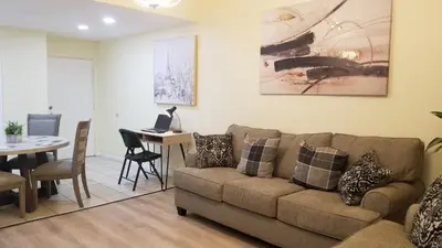 a living room with a couch and a table at 3648 Orlando Vacational Apartment in Orlando