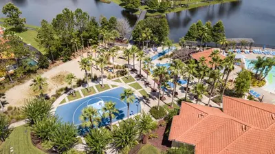 an overhead view of the pool at a resort at 133 Beautiful home with lake view in Kissimmee
