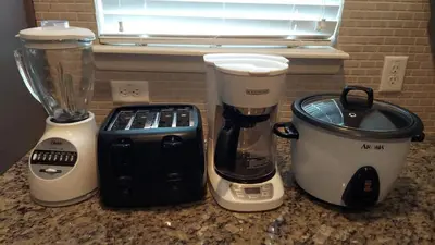 two blenders and a blender sitting on a counter at Cozy Decor 4BR at West Lucaya Resort WL8972 in Kissimmee