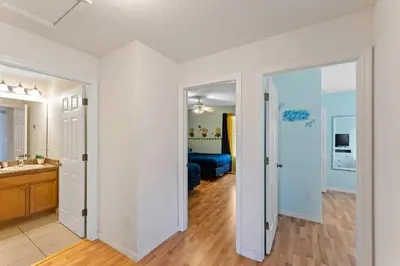 an empty room with a bathroom and a living room at 4BR Townhome with Lake View – BL481 in Kissimmee