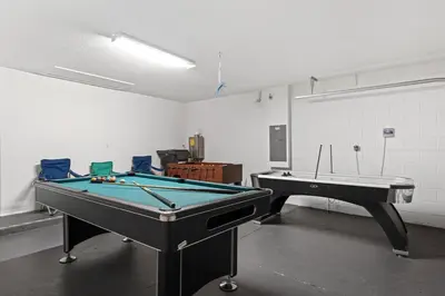 a room with two pool tables in a room at Ground floor spacious house 4BR VP2512 in Kissimmee