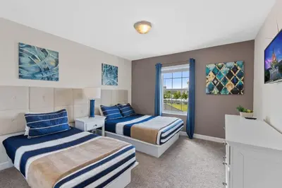 a bedroom with two beds and a window at Family Friendly Home 4BR Private Pool SL4823 in Kissimmee