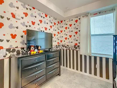 a childs bedroom with hearts on the wall at Luxury Brand NEW 2 bedroom apt near DISNEY! in Kissimmee