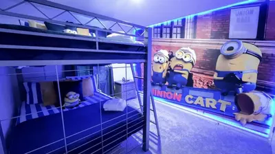 a room with a bunk bed with a cartoon car at NEW! Solara Pool Home 6 Miles to Disney in Kissimmee