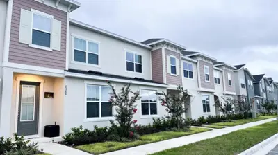 a row of houses in a row at NEW! Solara Pool Home 6 Miles to Disney in Kissimmee