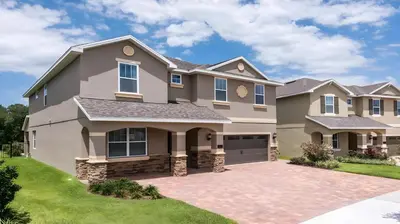 a large house with a driveway at Elegant Fun Vacation Home at Encore Resort 7529 in Orlando