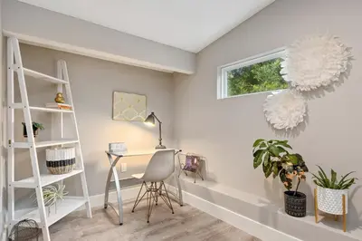 a home office with a desk and a window at 5Bd 4Bath villa, amazing outdoor space, pet friendly in Orlando