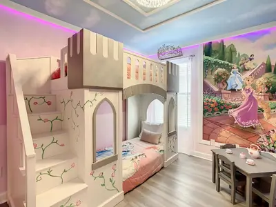 a room with a castle bedroom with a table at Marvelous Magical House: Amazing Themes and Pool, 5mi Disney in Kissimmee