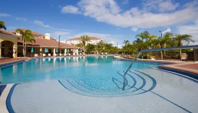 a large swimming pool in a resort at 3 Bed Penthouse Near Convention Center! condo in Orlando