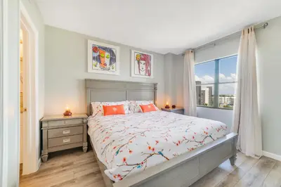 a bedroom with a bed and a window at Fabulous Resort Condo with Heated Pool! in Orlando
