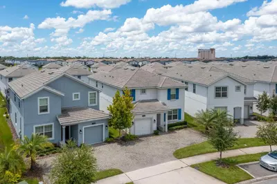 a row of houses in a residential neighborhood at Blue Moon House in Kissimmee