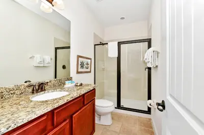 a bathroom with a sink and a toilet at Spectacular Home Near Disney With Private Pool And Waterpark & Resort Access At Encore Resorts Reunion - 7523Mr in Kissimmee