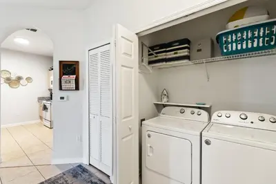 a kitchen with white appliances in a room at Making Memories At Windsor Palms Resort, Great Amenities And Much More Fun! in Kissimmee