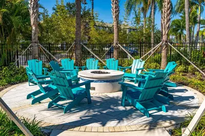 a group of blue chairs sitting around a table at Vista Cay Resort in Orlando
