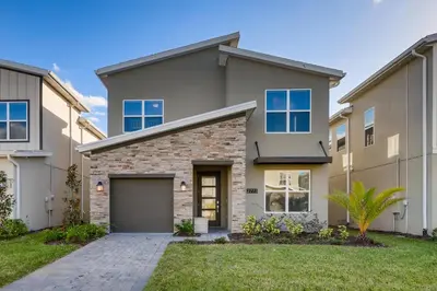 a house with a garage at 2773 BD - 5Bd Home with Private Pool 14 Guests in Kissimmee