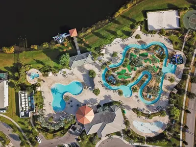 an aerial view of a pool at a resort at Star Hideaway At Storey Lake By Shine Villas #716 in Kissimmee