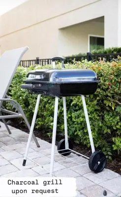 a bbq grill sitting on top of a table at 350 Pendant · 350 Villa - 8BD - Private Pool - Game room in Orlando