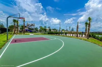 a basketball court in a park with palm trees at Amazing Lovely Private Pool 4844 in Kissimmee