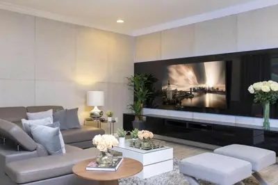 a living room with a large flat screen tv at Luxurious Home Private Pool 2693 in Kissimmee