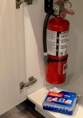 a fire hydrant hanging on a wall next to a box of cigarettes at Large Apartment, Close To Disney in Kissimmee