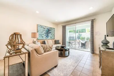 a living room with a couch and a table at 350-360 Huge Villas - near Disney - 15 BDs in Orlando