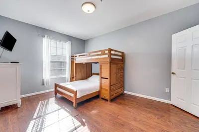 a bedroom with a bunk bed in a room at 6 Mi to Disney World Condo with Community Perks! in Kissimmee