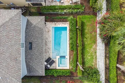 an aerial view of a swimming pool in a house at Luxurious Encore Villa 10 Min Disney Inc/Waterpark in Orlando