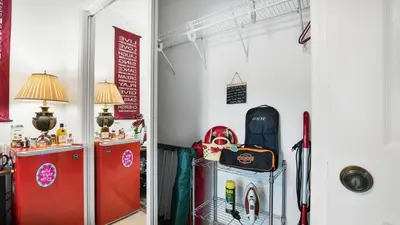 a room with two refrigerators and a refrigerator at La Maison de Lorbu - Apartment in Orlando