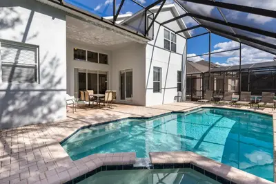 a swimming pool in the backyard of a house at Windsor Dream - 6 bedroom resort pool home in Orlando