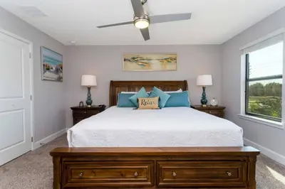 a bedroom with a bed and a ceiling fan at Mickey Safari near Disney 2 Master rooms 4708 in Kissimmee