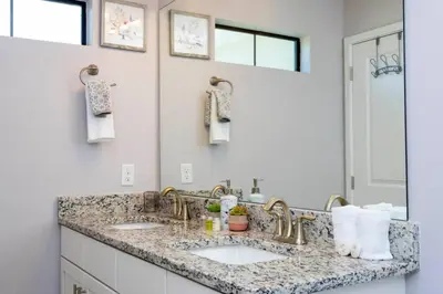 a bathroom with two sinks and a mirror at Mickey Safari near Disney 2 Master rooms 4708 in Kissimmee