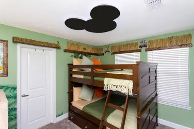 a room with a bunk bed with a black cloud overhead at Mickey Safari near Disney 2 Master rooms 4708 in Kissimmee